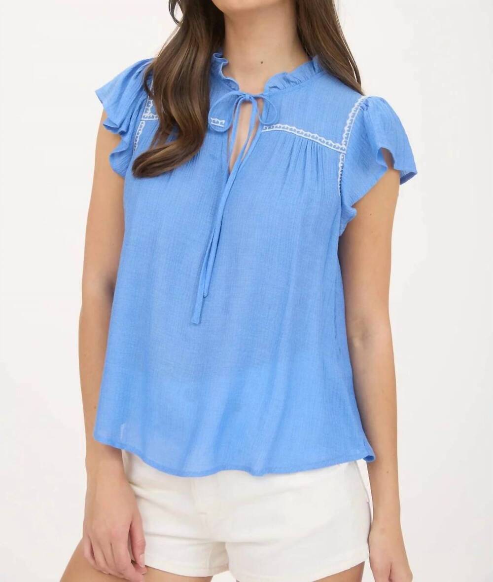 NEW MINE embroidery ruffle front tie top in blue